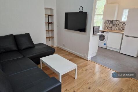 Open Kitchen Lounge With 50 Inch Smart Tv