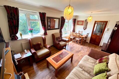 Bright and airy living area with dining space...