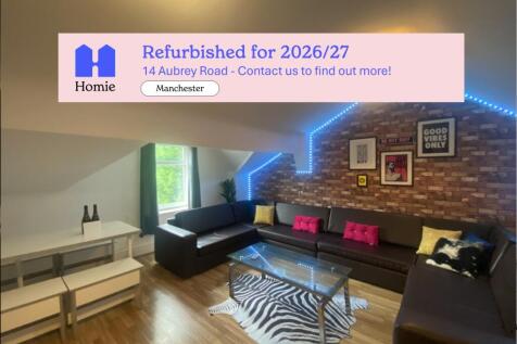 Bright contemporary living room with a feature ...