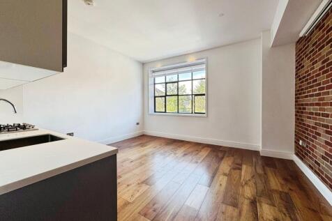 Reception/kitchen/dining area