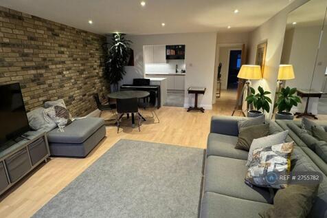 Living Room And Entry To The Kitchen