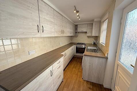 Bright kitchen with ample counter space...
