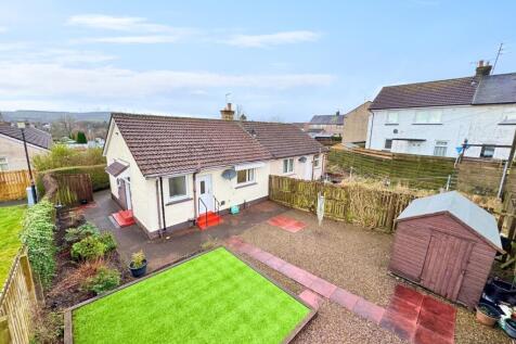 rear garden at bungalow in mair avenue dalry
