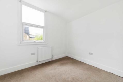 Bright and airy bedroom with fresh white walls...