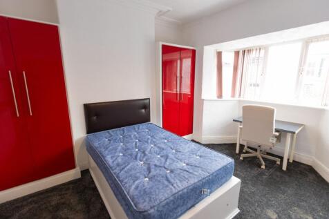 Bright and modern double bedroom featuring a co...