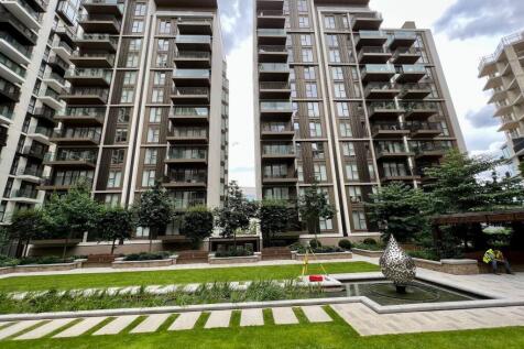 Well-kept communal courtyard with water feature...