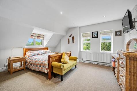 Bedroom One - bed and windows.jpg