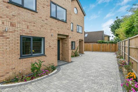 property in Grand Drive, 
Raynes Park, SW20