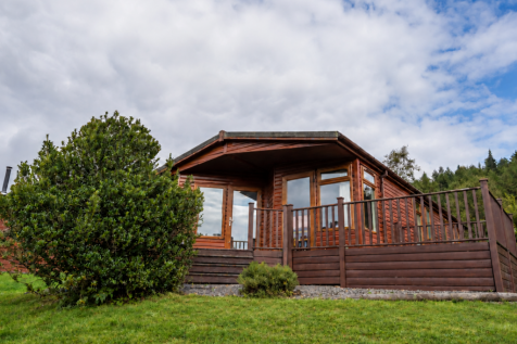 Exterior of the three-bedroom holiday lodge with r