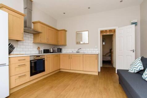 Bright, modern kitchen with plenty of workspace...