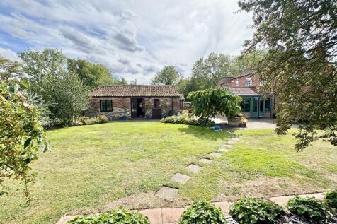Side view of stables