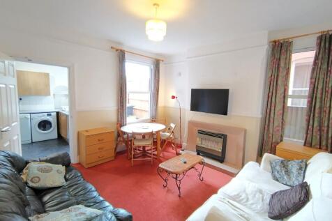 Bright and spacious lounge with dining area...
