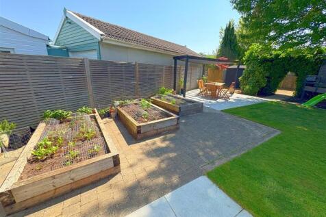 Vegetable beds and patio.jpg