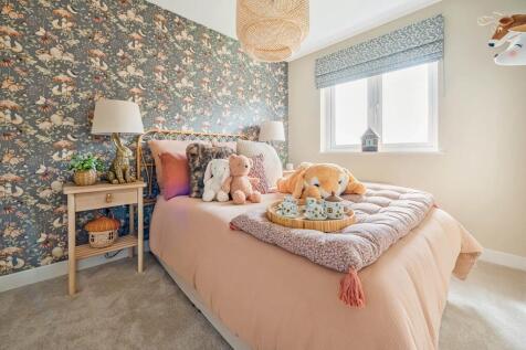 Bedroom 2 comfortably fits a double bed or two singles