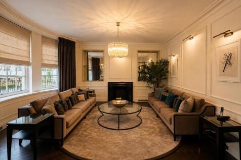 Spacious living room with elegant seating area...