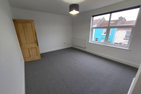 Bright, freshly painted double bedroom with a l...