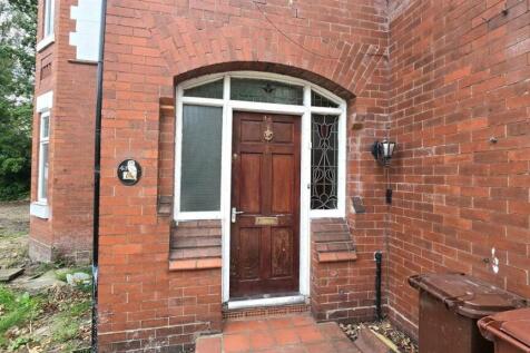 Welcoming front entrance with classic brickwork...