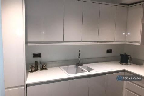 Kitchen Showing Many Units 