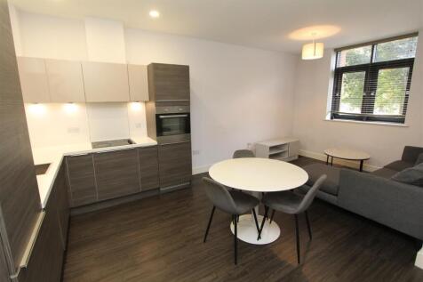 Modern open-plan kitchen and living area...