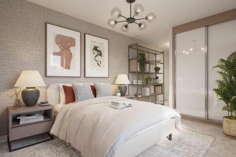 A spacious main bedroom with private ensuite