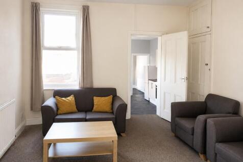 Bright lounge with comfy sofas and natural ligh...