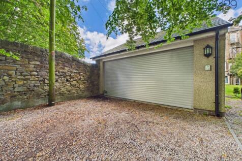 Spacious Double Garage and Off Street Parking