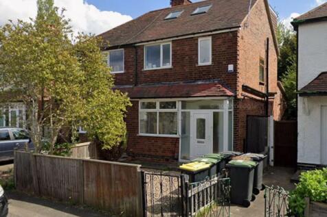 Charming semi-detached home with bright windows...