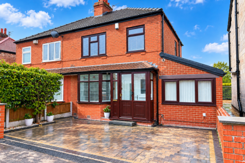 Crisp Red-Brick Suburban Home.png