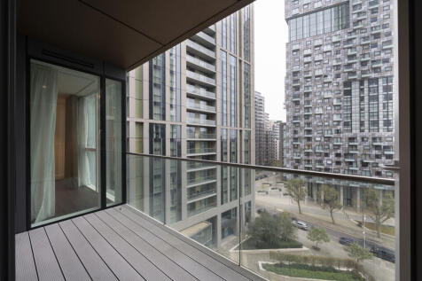 Relax and unwind with this stunning balcony view of contemporary skyscrapers.