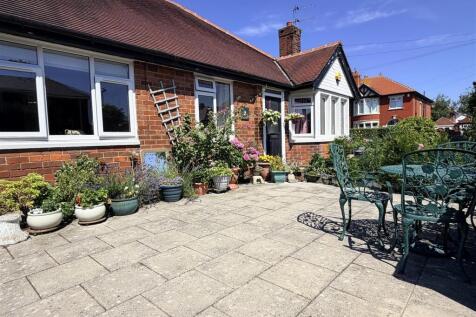 FRONT &amp; SIDE GARDENS