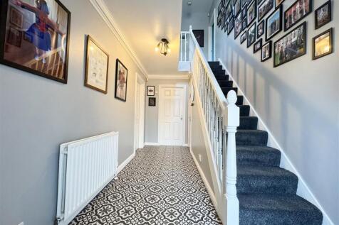 STAIRS RISING TO THE FIRST FLOOR