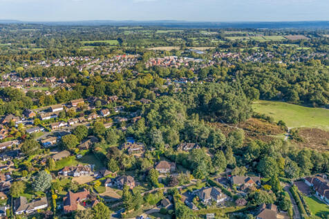 Drone of countryside &amp; front of house