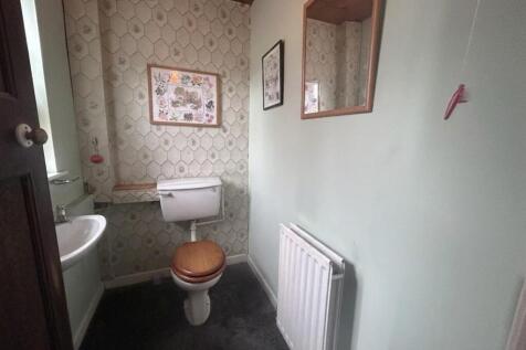 Downstairs WC ( Cleared using AI ).jpg