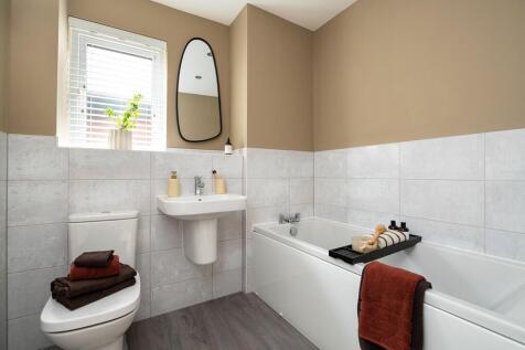 The main bathroom is perfect for busy mornings and relaxing evening soaks