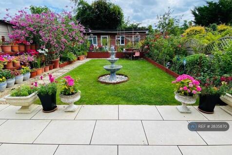 Garden With Summerhouse At The Rear