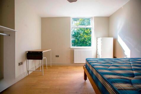 Bright single bedroom with window and wardrobe...