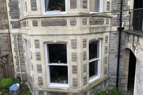 Stunning traditional stone facade with bay wind...