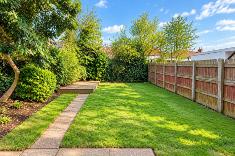 Bright Tidy Suburban Garden View.png