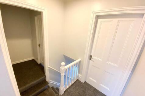 TO THE FIRST FLOOR LANDING