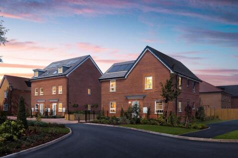 Dusk street scene with 3 and 4 bedroom homes at Fairway Gardens