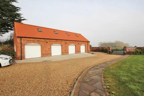 Detached four car garage