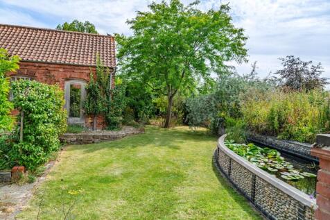 Twenty years of considered planting have shaped the gardens
