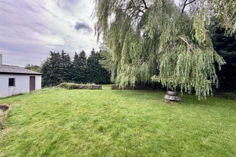 GARDENS, DOUBLE GARAGE AND DRIVEWAYS