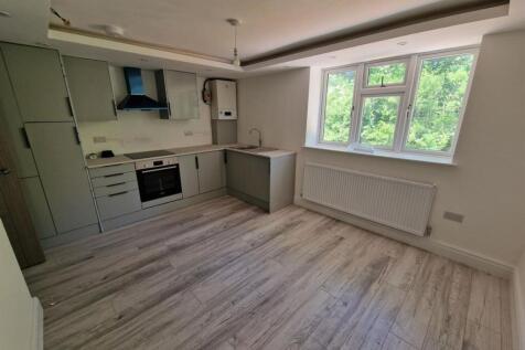 Bright modern kitchen with sleek cabinetry...
