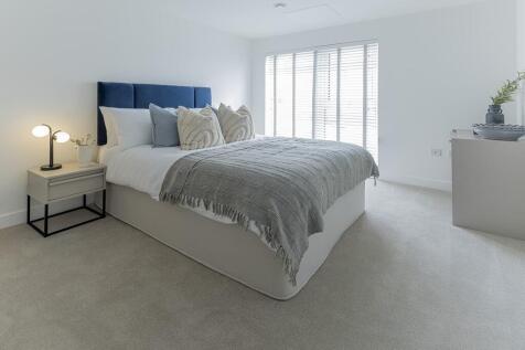 Bedroom two offers generous space and plenty of natural light