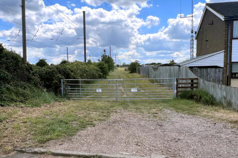 Double-gated entrance on East Road.