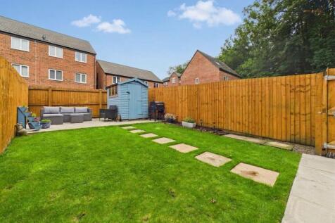 Landscaped and enclosed rear garden