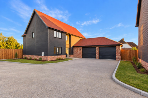 Modern Suburban Home in Golden Light.png