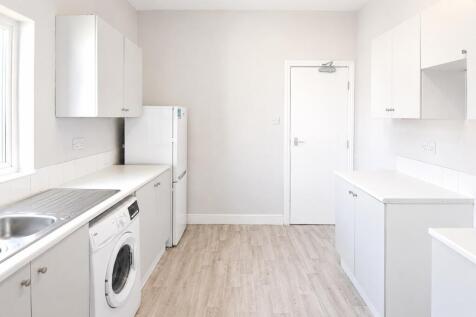 Bright modern kitchen with ample storage space...