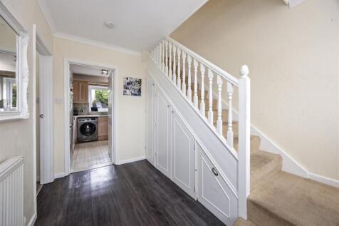 Stairs rising to First Floor